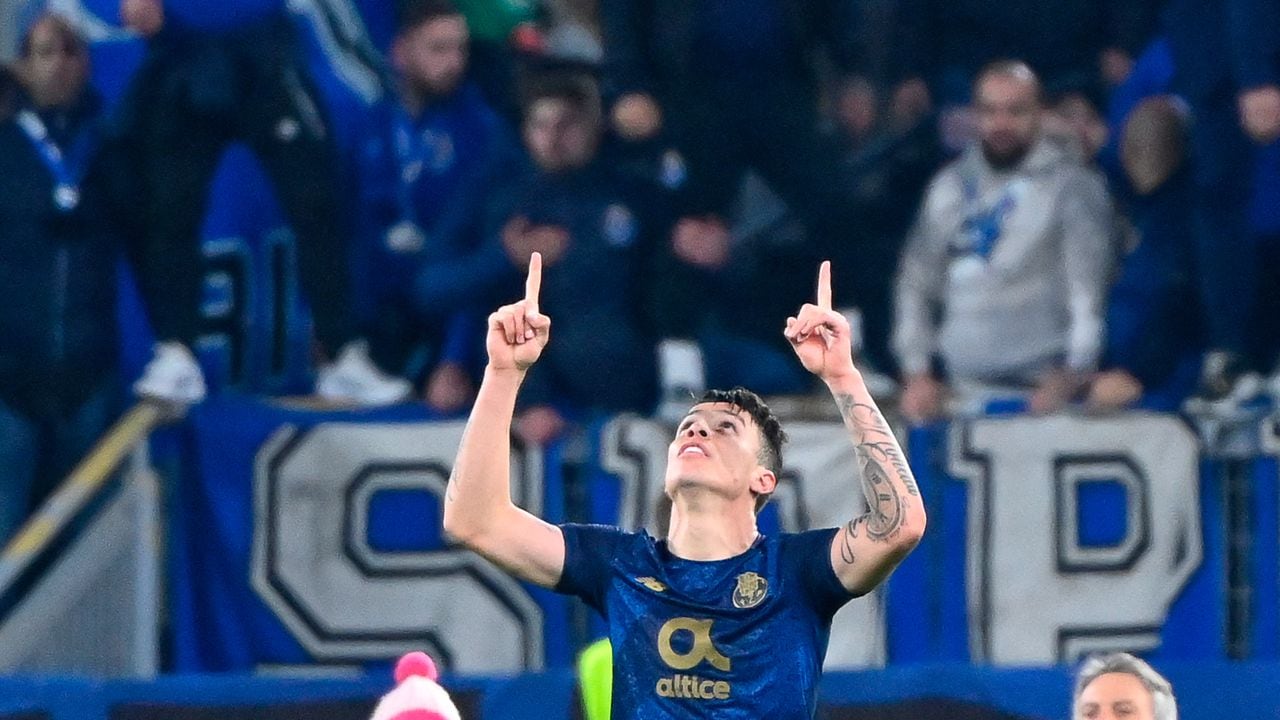 FC Porto�s Colombian midfielder Mateus Uribe celebrates after scoring a goal  during  the UEFA Europa League football knockout round play-off second leg match between Lazio and FC Porto at The Olympic Stadium in Rome on February 24, 2022. (Photo by Alberto PIZZOLI / AFP)