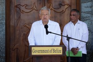 Handout picture released by Mexico's Presidency Press Office showing Belize's PM Johnny Brice�o (R) and Mexican President Andr�s Manuel L�pez Obrador (L) during the latter's official visit, in Belize City, on May 7, 2022. (Photo by Handout / PRESIDENCIA DE MEXICO / AFP) / RESTRICTED TO EDITORIAL USE - MANDATORY CREDIT "AFP PHOTO / MEXICO'S PRESIDENCY PRESS OFFICE" - NO MARKETING NO ADVERTISING CAMPAIGNS - DISTRIBUTED AS A SERVICE TO CLIENTS