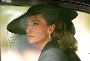 Britain's Catherine, Princess of Wales, sits in a car during the State Funeral Service for Britain's Queen Elizabeth II in London on September 19, 2022. (Photo by Mike Egerton / POOL / AFP)