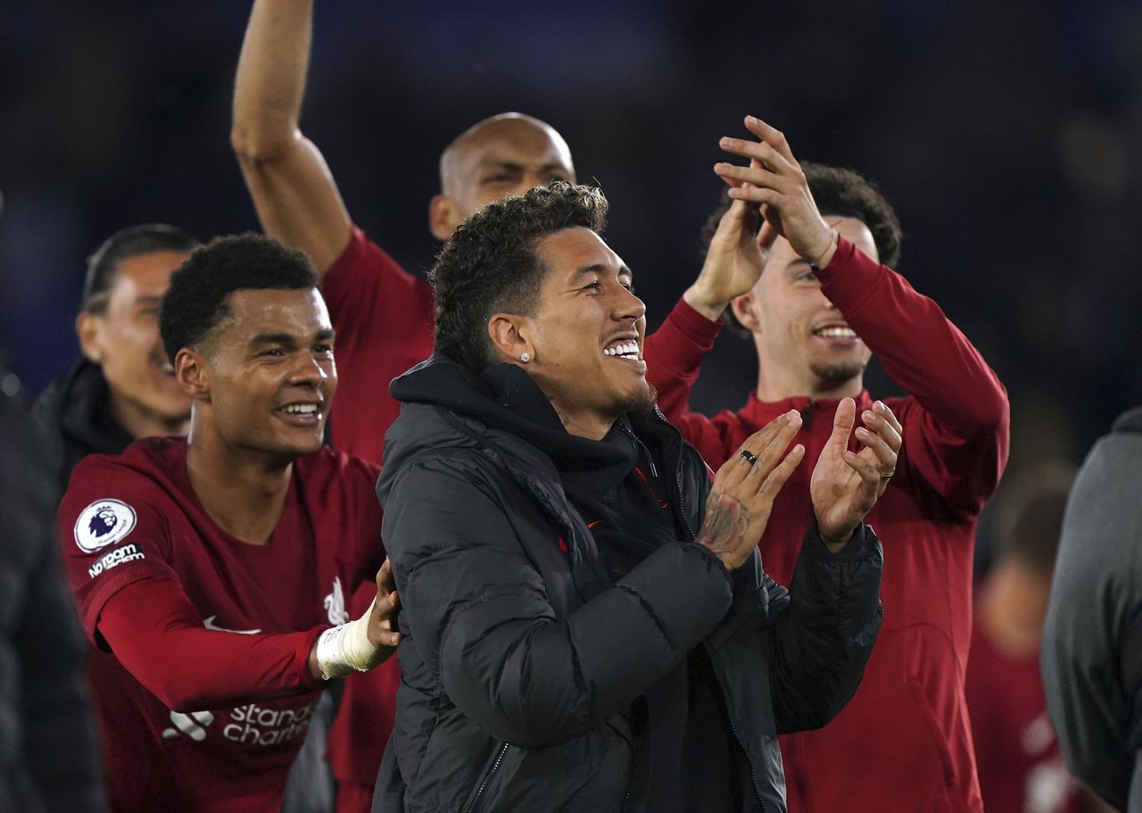 Liverpool's Roberto Firmino gestures to the crowd after the English Premier League soccer match between Leicester City and Liverpool at the King Power Stadium, Leicester, England, Monday May 15, 2023. (Tim Goode/PA via AP)