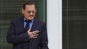 FAIRFAX, VIRGINIA - MAY 27: Actor Johnny Depp takes a break during his trial at a Fairfax County Courthouse on May 27, 2022 in Fairfax, Virginia. Closing arguments in the Depp v. Heard defamation trial, brought by Johnny Depp against his ex-wife Amber Heard, begins today. (Photo by Kevin Dietsch/Getty Images)