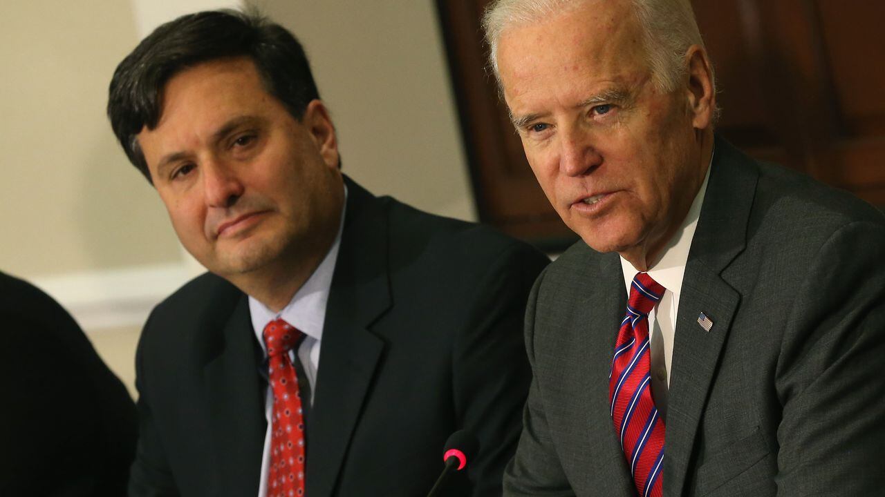 (FILES) In this file photo taken on November 13, 2014 US Vice President Joseph Biden (R) joined by Ebola Response Coordinator Ron Klain (L), speaks during a meeting regarding Ebola at the Eisenhower Executive office building in Washington, D.C. - US President-elect Joe Biden on November 11 announced he has chosen Ron Klain, a seasoned Democratic operative, as his chief of staff, his first public White House personnel choice.