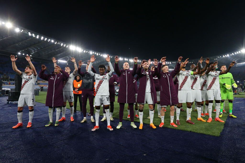 ROME, ITALY - MAY 02: Players of Bayer Leverkusen celebrate victory with the fans in the UEFA Europa League 2023/24 Semi-Final first leg match between AS Roma and Bayer 04 Leverkusen at Stadio Olimpico on May 02, 2024 in Rome, Italy. (Photo by Paolo Bruno/Getty Images)