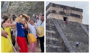 Mujer es agredida por subir a una de las piramides de Chichén Itza pese a estar prohibido.