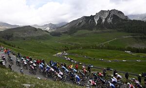 Cyclist climb up to the Crocedomini pass during the 16th stage of the Giro D'Italia cycling race, from Salò to Aprica, Italy, Tuesday, May 24, 2022. (Fabio Ferrari/LaPresse via AP)