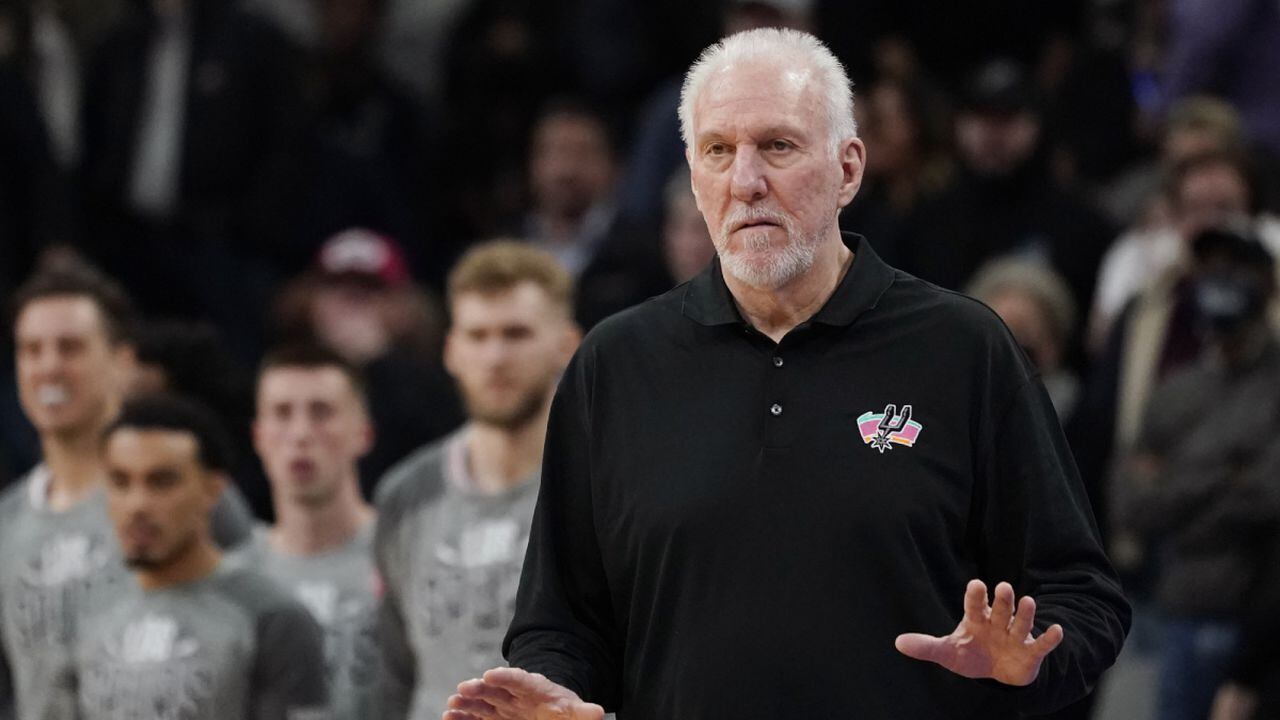 San Antonio Spurs head coach Gregg Popovich signals to his players during the second half of an NBA basketball game against the Utah Jazz, Friday, March 11, 2022, in San Antonio. The Spurs won, making Popovich the all-time winningest coach in NBA regular-season history. (AP/Eric Gay)