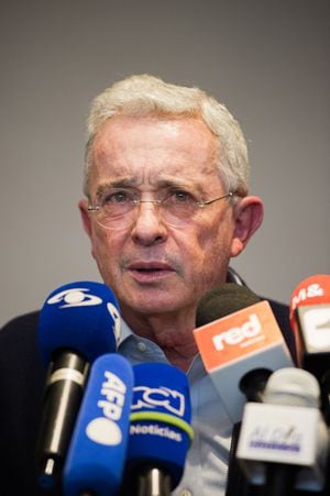 A headshot of Colombia's former president Alvaro Uribe Velez (2002-2010) and political leader of the political party 'Centro Democratico' talks during a press conference of the presidential candidate Oscar Ivan Zuluaga in Bogota, Colombia on February 14, 2022. Uribe is known as the most influential politician in Colombia who also faces a trial for witness manipulation on the Supreme Court since October 2019. (Photo by Sebastian Barros/NurPhoto via Getty Images)