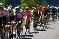 Pink jersey Team UAE's Slovenian rider Tadej Pogacar rides in the pack during the 8th stage of the 107th Giro d'Italia cycling race, 152km between Spoleto and Prati di Tivo, on May 11, 2024. (Photo by Luca Bettini / AFP)