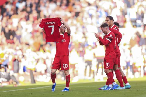LIVERPOOL, ENGLAND - OCTOBER 29: Diogo Jota of Liverpool holds the shirt of teammate Luis Diaz after scoring their first goal to make the score 1-0 during the Premier League match between Liverpool FC and Nottingham Forest at Anfield on October 29, 2023 in Liverpool, England. (Photo by Daniel Chesterton/Offside/Offside via Getty Images)
