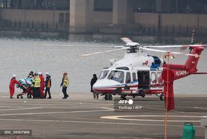 South Korean opposition party leader Lee Jae-myung, who was attacked in Busan, gets off from a helicopter on a stretcher to be transported to Seoul National University Hospital, at a heliport in Seoul on January 2, 2024. South Korean opposition party leader Lee Jae-myung was stabbed in the neck on January 2, by a man who pushed through a crowd pretending to be his supporter. (Photo by Yonhap / YONHAP / AFP) / - South Korea OUT / NO ARCHIVES -  RESTRICTED TO SUBSCRIPTION USE