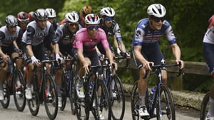 Belgium's Remco Evenepoel, center, pedals with the pack during the third stage of the Giro d'Italia cycling race from Vasto to Melfi, Italy, Monday, May 8, 2023. (Fabio Ferrari/LaPresse via AP)