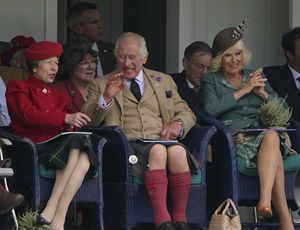 From left, Britain's Princess Anne, the Princess Royal, King Charles III and Queen Camilla  react, during the Braemar Gathering highland games, in Braemar, a short distance from the royals' summer retreat at the Balmoral estate in Aberdeenshire, Scotland, Saturday, Sept. 2, 2023. (Andrew Milligan/PA via AP)