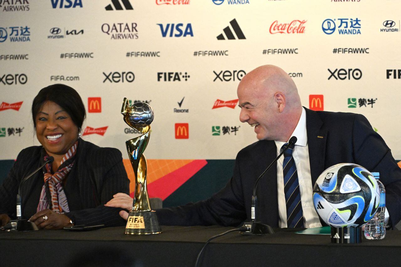 FIFA president Gianni Infantino (R) and FIFA Secretary General Fatma Samoura attend a press conference in Auckland on July 19, 2023, ahead of the Women�s World Cup football tournament. (Photo by Saeed KHAN / AFP)