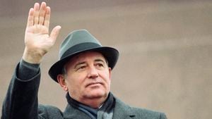 FILE - Soviet President Mikhail Gorbachev waves from the Red Square tribune during a Revolution Day celebration, in Moscow, Soviet Union, Tuesday, Nov. 7, 1989. Russian news agencies are reporting that former Soviet President Mikhail Gorbachev has died at 91. The Tass, RIA Novosti and Interfax news agencies cited the Central Clinical Hospital. (AP Photo/Boris Yurchenko, File)