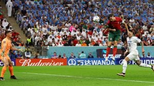 Soccer Football - FIFA World Cup Qatar 2022 - Group H - Portugal v Uruguay - Lusail Stadium, Lusail, Qatar - November 28, 2022Portugal's Cristiano Ronaldo scores their first goal REUTERS/Lee Smith