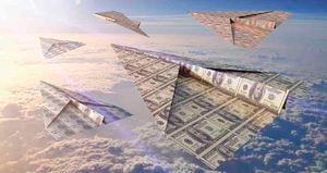 Currency bills folded into paper airplanes in atmosphere