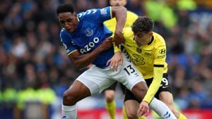 LIVERPOOL, ENGLAND - MAY 01: Yerry Mina of Everton is challenged by Kai Havertz of Chelsea during the Premier League match between Everton and Chelsea at Goodison Park on May 01, 2022 in Liverpool, England. (Photo by Jan Kruger/Getty Images)