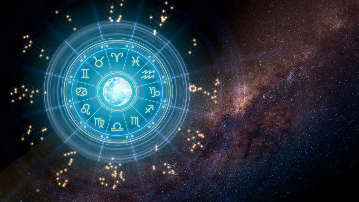 Zodiac signs inside of horoscope circle. Astrology in the sky with many stars and moons astrology and horoscopes concept.