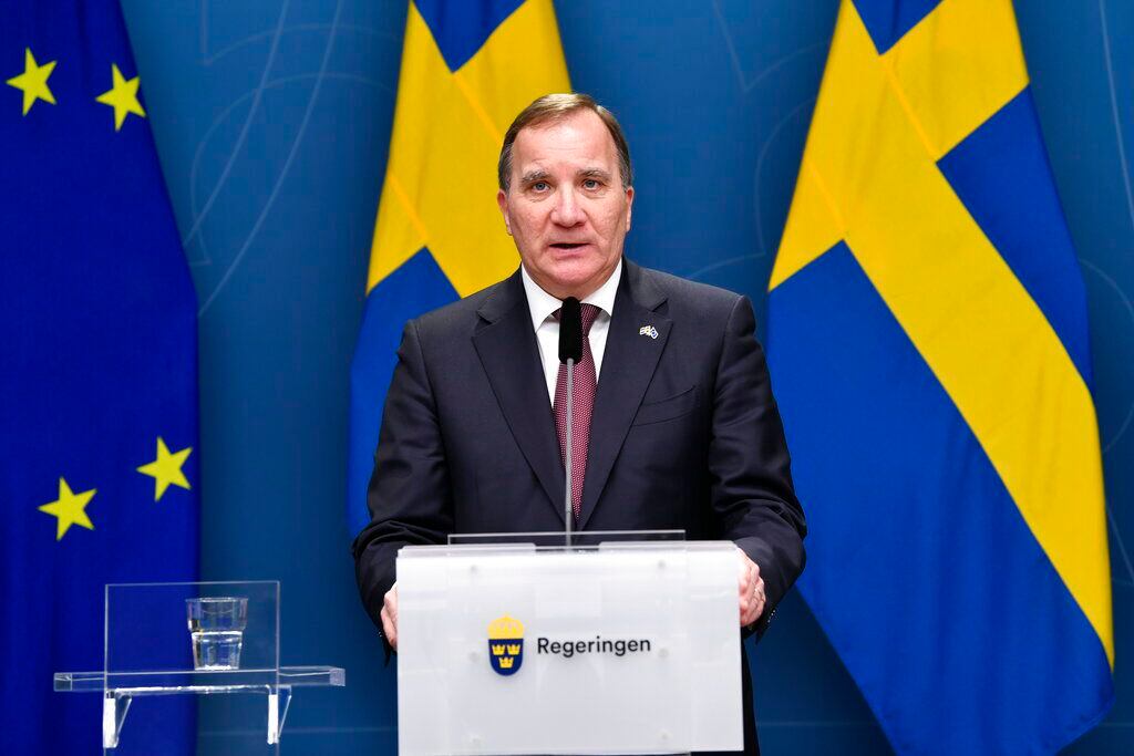 Sweden's Prime Minister Stefan Lofven talks about coronavirus advice before Christmas and the New Year holidays during a press conference in Stockholm, Sweden, Tuesday Dec. 8, 2020. (Henrik Montgomery / TT via AP)