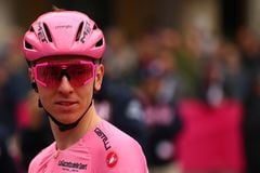 Pink Jersey Team UAE's Slovenian rider Tadej Pogacar looks on during the signature ceremony ahead of the 3rd stage of the 107th Giro d'Italia cycling race, 166 km between Novara and Fossano, on May 6, 2024 in Novara. (Photo by Luca Bettini / AFP)
