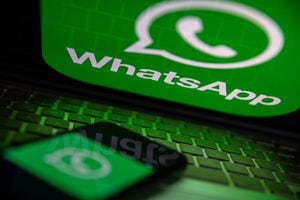 TURKEY - 2022/10/25: In this photo illustration, a WhatsApp logo seen displayed on a smartphone screen and on a laptop. (Photo Illustration by Onur Dogman/SOPA Images/LightRocket via Getty Images)