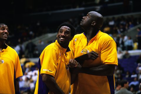 FILE:  Kobe Bryant of the Los Angeles Lakers smiles as Shaquille O'Neal looks up during a National Basketball Association game against the Milwaukee Bucks at the Staples Center in Los Angeles, CA. (Photo by Matt A. Brown/Icon Sportswire via Getty Images)