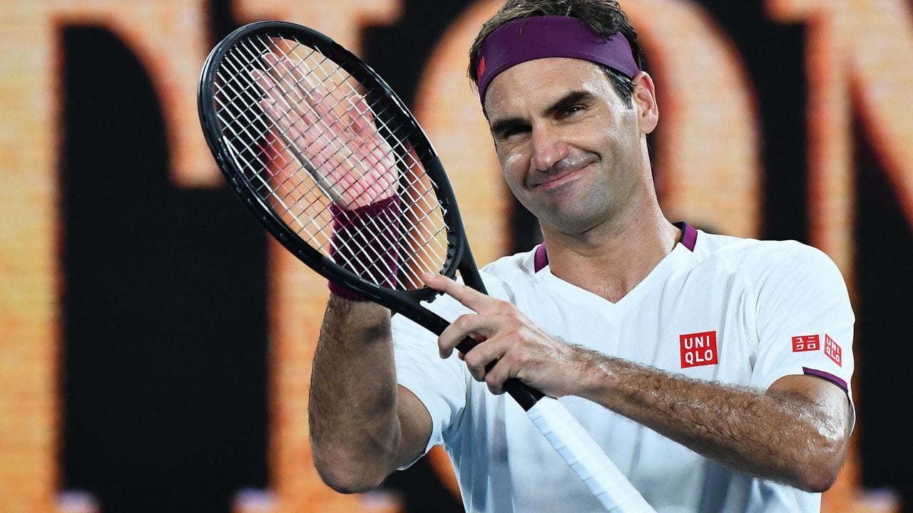 (FILES) In this file photo taken on January 26, 2020 Switzerland's Roger Federer celebrates after victory against Hungary's Marton Fucsovics during their men's singles match on day seven of the Australian Open tennis tournament in Melbourne. - Roger Federer announces his retirement in a statement on September 15, 2022. (Photo by William WEST / AFP) / IMAGE RESTRICTED TO EDITORIAL USE - STRICTLY NO COMMERCIAL USE