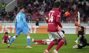 Napoli's Andrea Petagna, left, tries to score during the group C, Europa League soccer match between Spartak Moscow and Napoli at Spartak stadium in Moscow, Russia, Wednesday, Nov. 24, 2021. (AP Photo/Pavel Golovkin)
