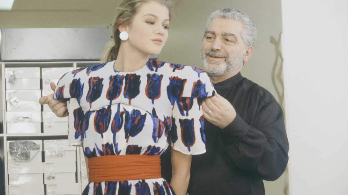 Ingrid Seynhaeve, designer Paco Rabanne's top model, during a fitting session with the designer in his Paris studio on January 30, 1991. (Photo by julio donoso/Sygma via Getty Images)