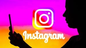 BRAZIL - 2022/03/21: In this photo illustration, a woman's silhouette is holding a smartphone with an Instagram logo in the background. (Photo Illustration by Rafael Henrique/SOPA Images/LightRocket via Getty Images)