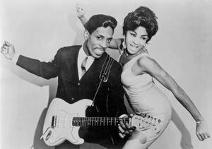 CIRCA 1961: Husband-and-wife R&B duo Ike & Tina Turner pose for a portrait in circa 1961. Ike Turner is holding a Fender Stratocaster electric guitar. (Photo by Michael Ochs Archives/Getty Images)