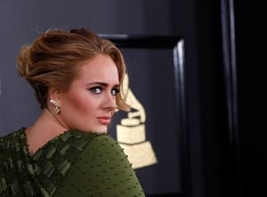 FILE PHOTO: Singer Adele arrives at the 59th Annual Grammy Awards in Los Angeles, California, U.S. , February 12, 2017. REUTERS/Mario Anzuoni/File Photo