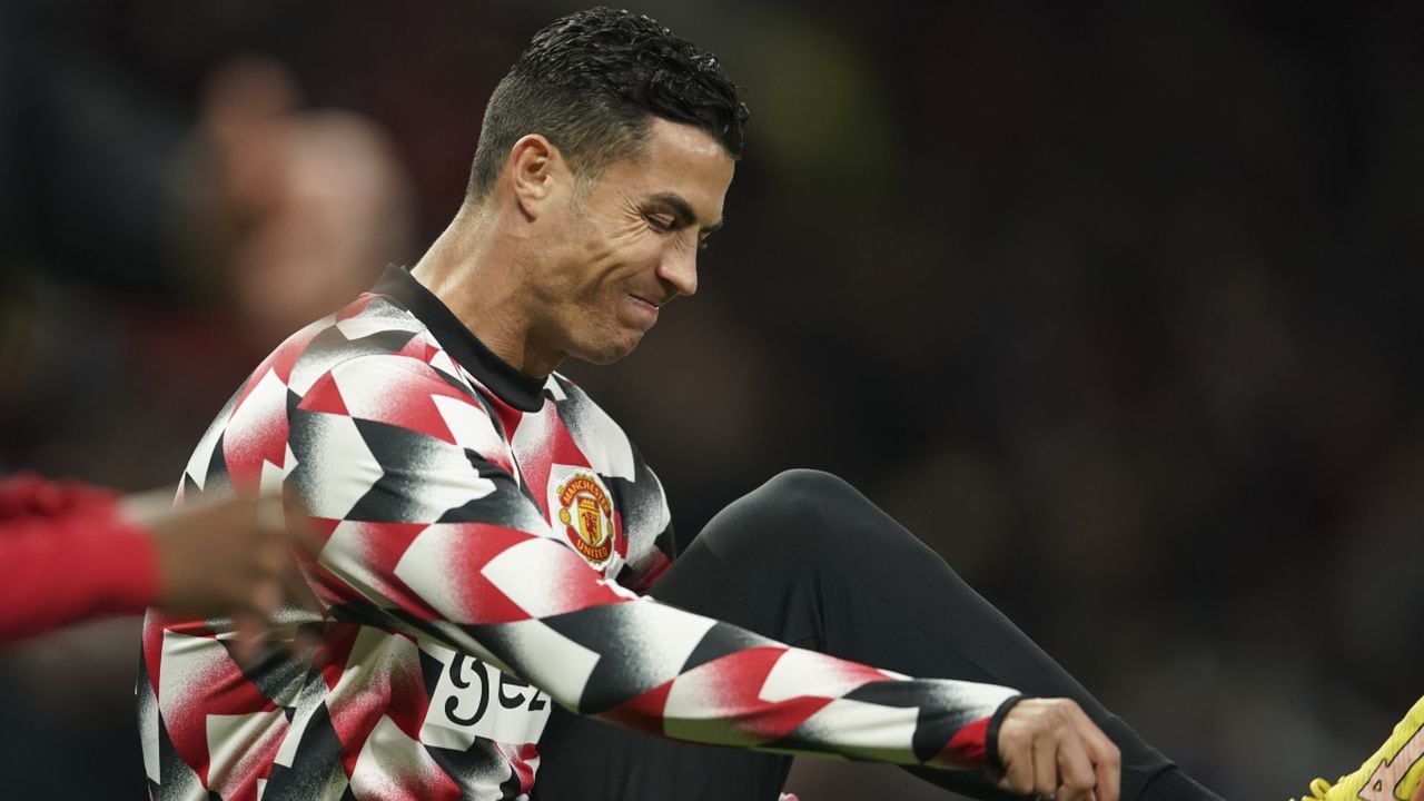 Manchester United's Cristiano Ronaldo warms up ahead of the English Premier League soccer match between Manchester United and Tottenham Hotspur at Old Trafford in Manchester, England, Wednesday, Oct. 19, 2022. (AP/Dave Thompson)