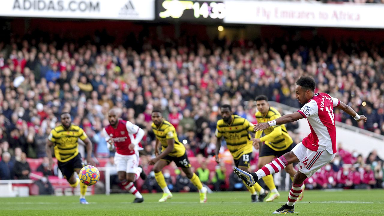 Arsenal's Pierre-Emerick Aubameyang sees his penalty saved, during the English Premier League soccer match between Arsenal and Watford at the Emirates Stadium, London, Sunday Nov. 7, 2021. (John Walton/PA via AP)