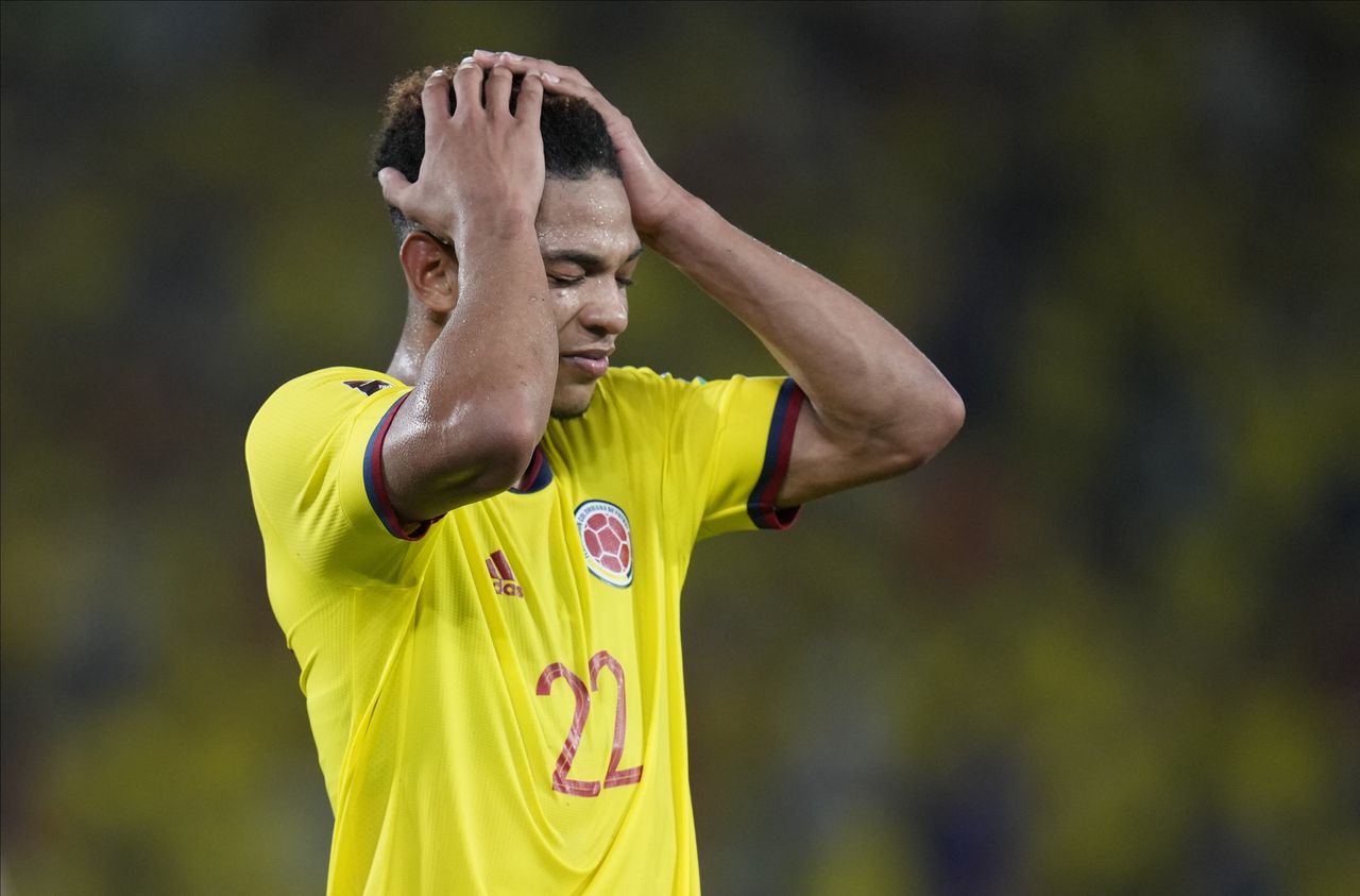 Colombia's Diego Valoyes reacts after missing a shot on goal during a qualifying soccer match for the FIFA World Cup Qatar 2022 against Paraguay, at Metropolitano stadium in Barranquilla, Colombia, Tuesday, Nov. 16, 2021. (AP Photo/Fernando Vergara)