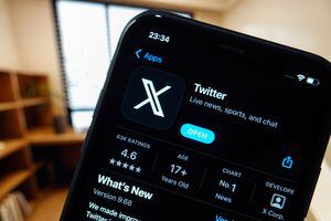 CHINA - 2023/07/29: In this photo illustration, the Twitter "X" app's new logo is displayed on the screen of a smartphone. (Photo Illustration by Sheldon Cooper/SOPA Images/LightRocket via Getty Images)