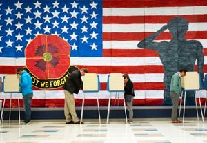 Voters cast their ballots at Robious Elementary School during the US midterm election in Midlothian, Virginia, on November 8, 2022. (Photo by Ryan M. Kelly / AFP)