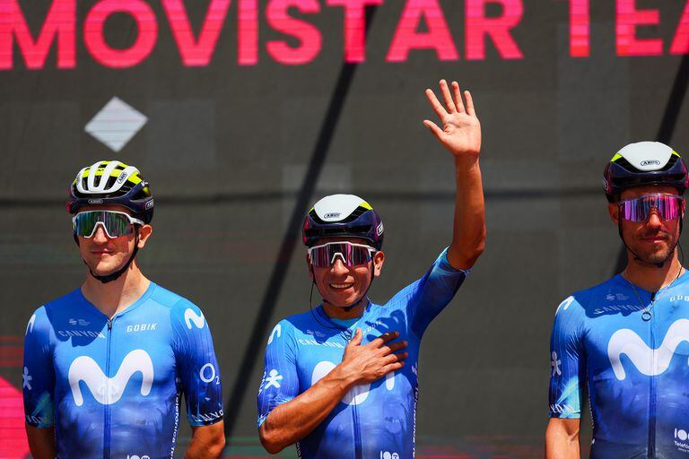 Team Movistar's Colombian rider Nairo Quintana (C) waves during the signature ceremony ahead of the start of the stage 1 of the Giro d'Italia 2024 cycling race, 140 km between Venaria Reale and Torino on May 4, 2024. The 107th edition of the Giro d'Italia, with a total of 3400,8 km, departs from Veneria Reale near Turin on May 4, 2024 and will finish in Rome on May 26, 2024. (Photo by Luca Bettini / AFP)
