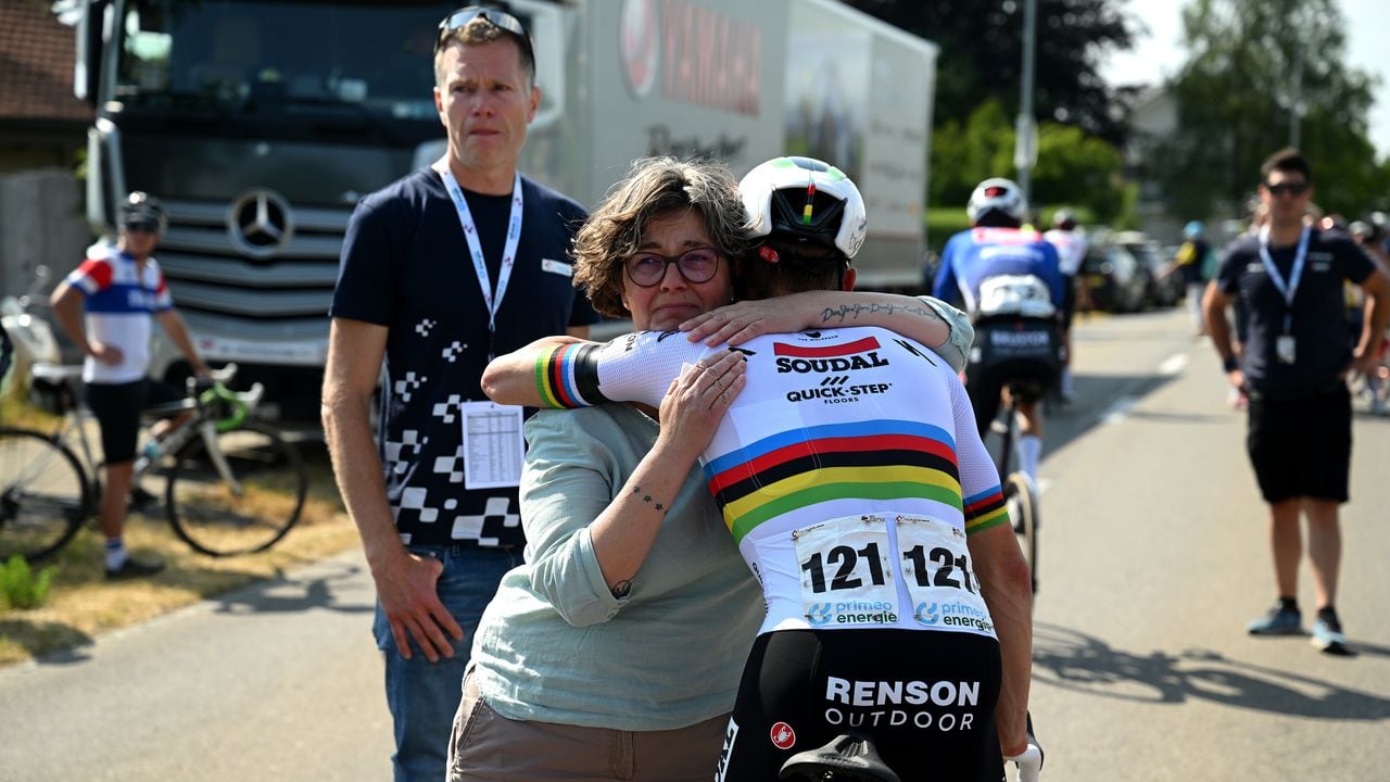 OBERWIL-LIELI, SWITZERLAND - JUNE 16: Gino Mäder mother Heidi Mäder receives condolences from Remco Evenepoel of Belgium and Team Soudal Quick-Step during the "Gino Memorial Ride" after the cancelation of the stage 6 due to the death of Gino Mäder of Switzerland and Team Bahrain Victorious after the crash suffered in yesterday's stage / #UCIWT / on June 16, 2023 in Oberwil-Lieli, Switzerland. (Photo by Dario Belingheri/Getty Images)