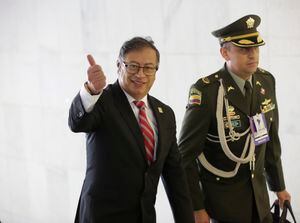 Colombia's President Gustavo Petro gives a thumbs up upon arrival for the South American Summit at Itamaraty palace in Brasilia, Brazil, Tuesday, May 30, 2023. South America's leaders are gathering as part of President Luiz Inácio Lula da Silva's attempt to reinvigorate regional integration efforts. (AP Photo/Gustavo Moreno)