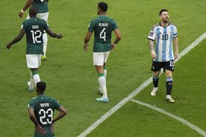 Argentina's Lionel Messi, right, reacts during the World Cup group C soccer match between Argentina and Saudi Arabia at the Lusail Stadium in Lusail, Qatar, Tuesday, Nov. 22, 2022. (AP Photo/Luca Bruno)