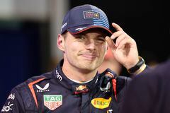 Red Bull Racing's Dutch driver Max Verstappen celebrates after claiming the pole position in the Bahrain Formula One Grand Prix at the Bahrain International Circuit in Sakhir on March 1, 2024. (Photo by Giuseppe CACACE / AFP)