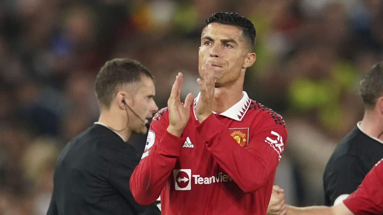 Manchester United's Cristiano Ronaldo applauds at the end of the English Premier League soccer match between Manchester United and Liverpool at Old Trafford stadium, in Manchester, England, Monday, Aug 22, 2022. (AP Photo/Dave Thompson)