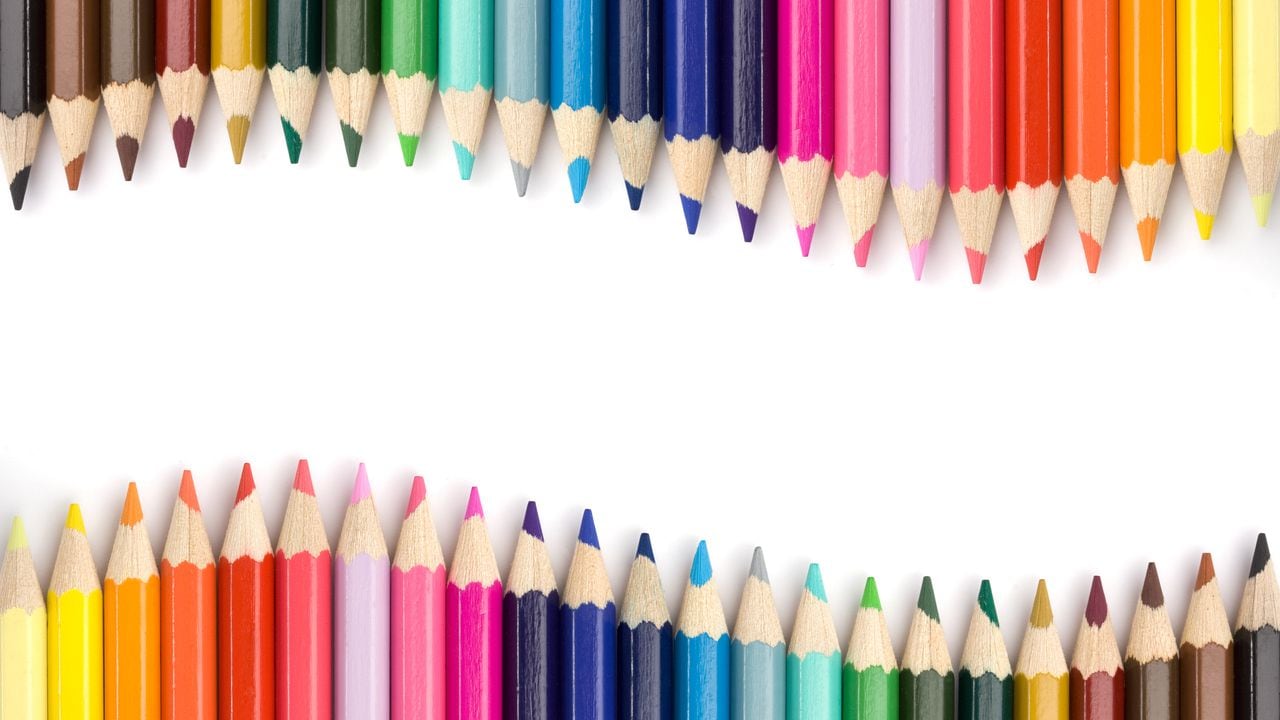 Top view of colored pencils frame arranged on white background.Similar: