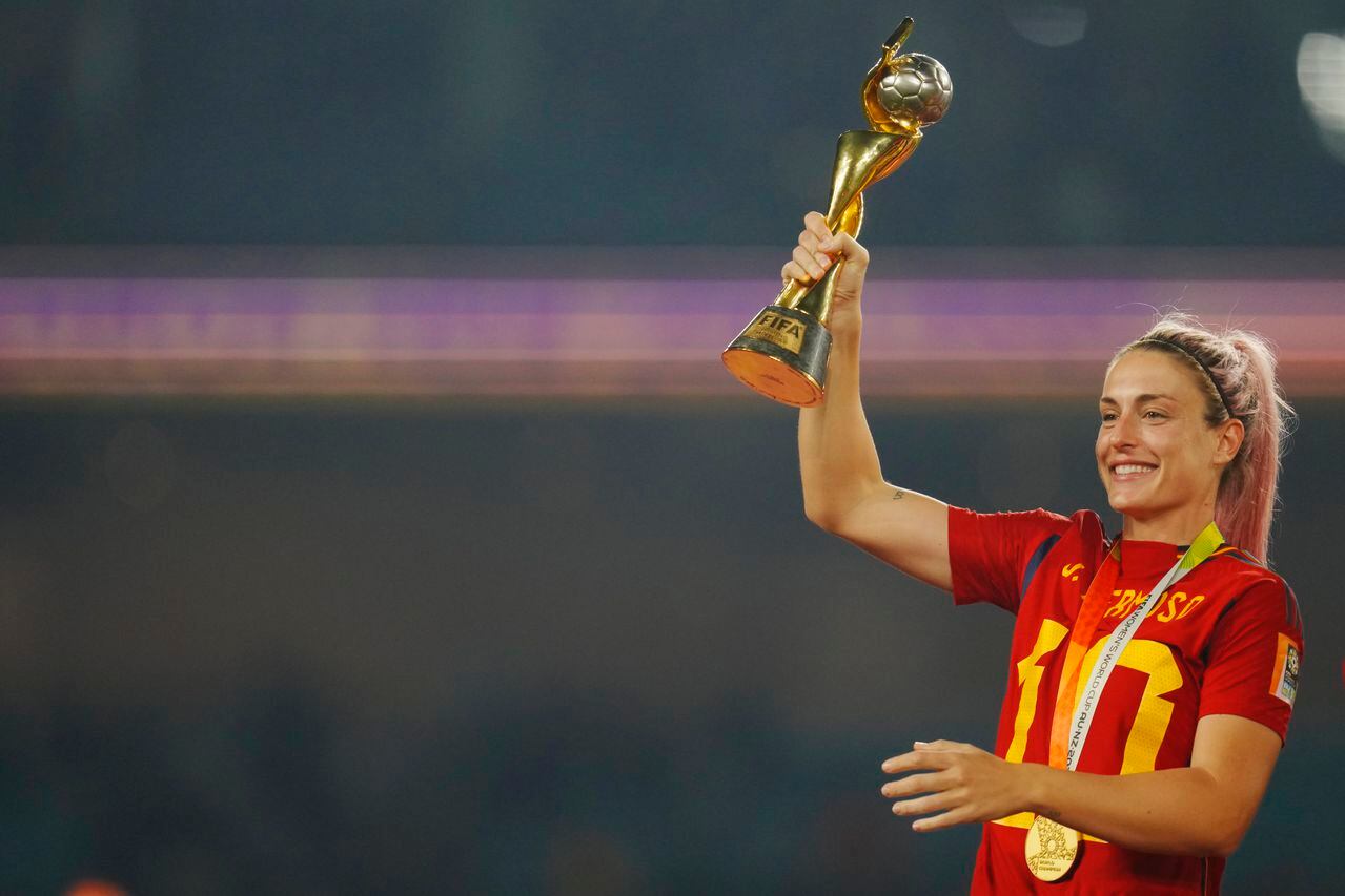 Spain's Alexia Putellas holds the trophy celebrating at the end of the Women's World Cup soccer final between Spain and England at Stadium Australia in Sydney, Australia, Sunday, Aug. 20, 2023. Spain won 1-0. (AP Photo/Abbie Parr)