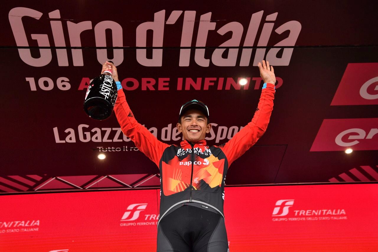 Colombia's Santiago Buitrago celebrates on podium winning the 19th stage of the Giro D'Italia , tour of Italy cycling race, from Longarone to Tre Cime di Lavaredo, Italy, Friday, May 26, 2023. (Massimo Paolone/LaPresse via AP)