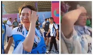 Una mujer hincha por la Selección argentina en el mundial. Lo curioso es que no parece ser gaucha.