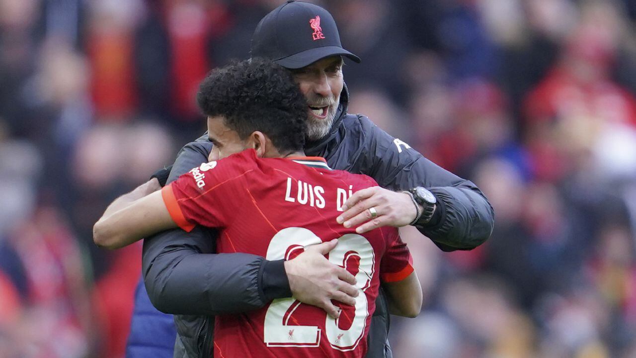 Liverpool's manager Jurgen Klopp embraces Liverpool's Luis Diaz after the FA Cup fourth round soccer match between Liverpool and Cardiff City at Anfield stadium in Liverpool, England, Sunday, Feb. 6, 2022. (AP/Jon Super)