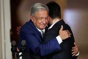 Chile's President Gabriel Boric and Mexico's President Andres Manuel Lopez Obrador embrace as they deliver a statement to the media at La Moneda government palace in Santiago, Chile, September 10, 2023. REUTERS/Ivan Alvarado