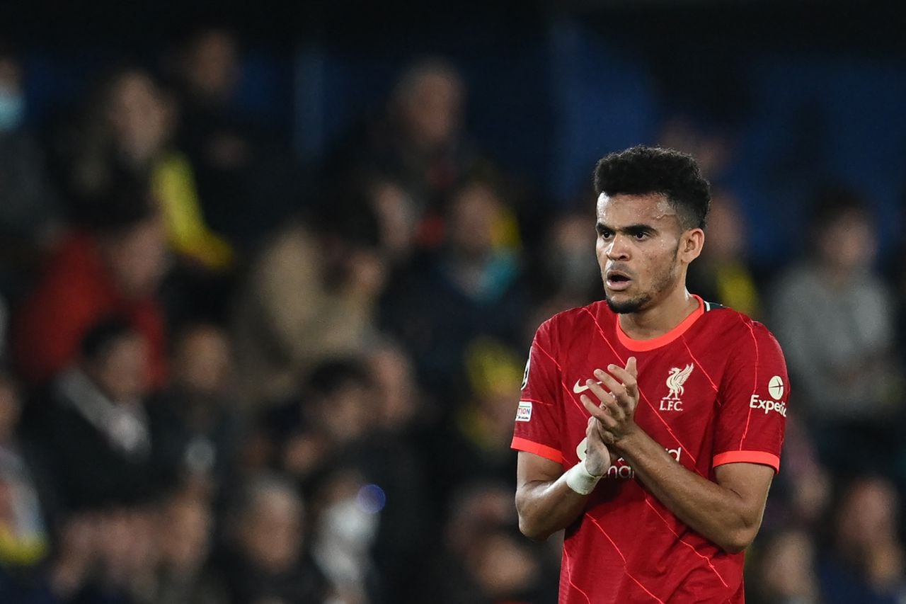 Liverpool's Colombian midfielder Luis Diaz celebrates scoring his team's second goal during the UEFA Champions League semi final second leg football match between Liverpool and Villarreal CF at La Ceramica stadium in Vila-real on May 3, 2022. (Photo by Paul ELLIS / AFP)